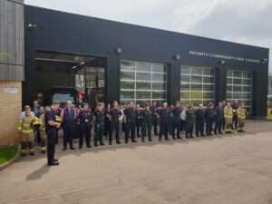 Firefighters standing outside Penrith Fire Station